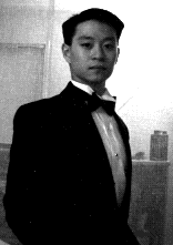 This is an image of me wearing a tuxedo.  
You're really missing out:  come back with a graphical browser and be 
amazed.